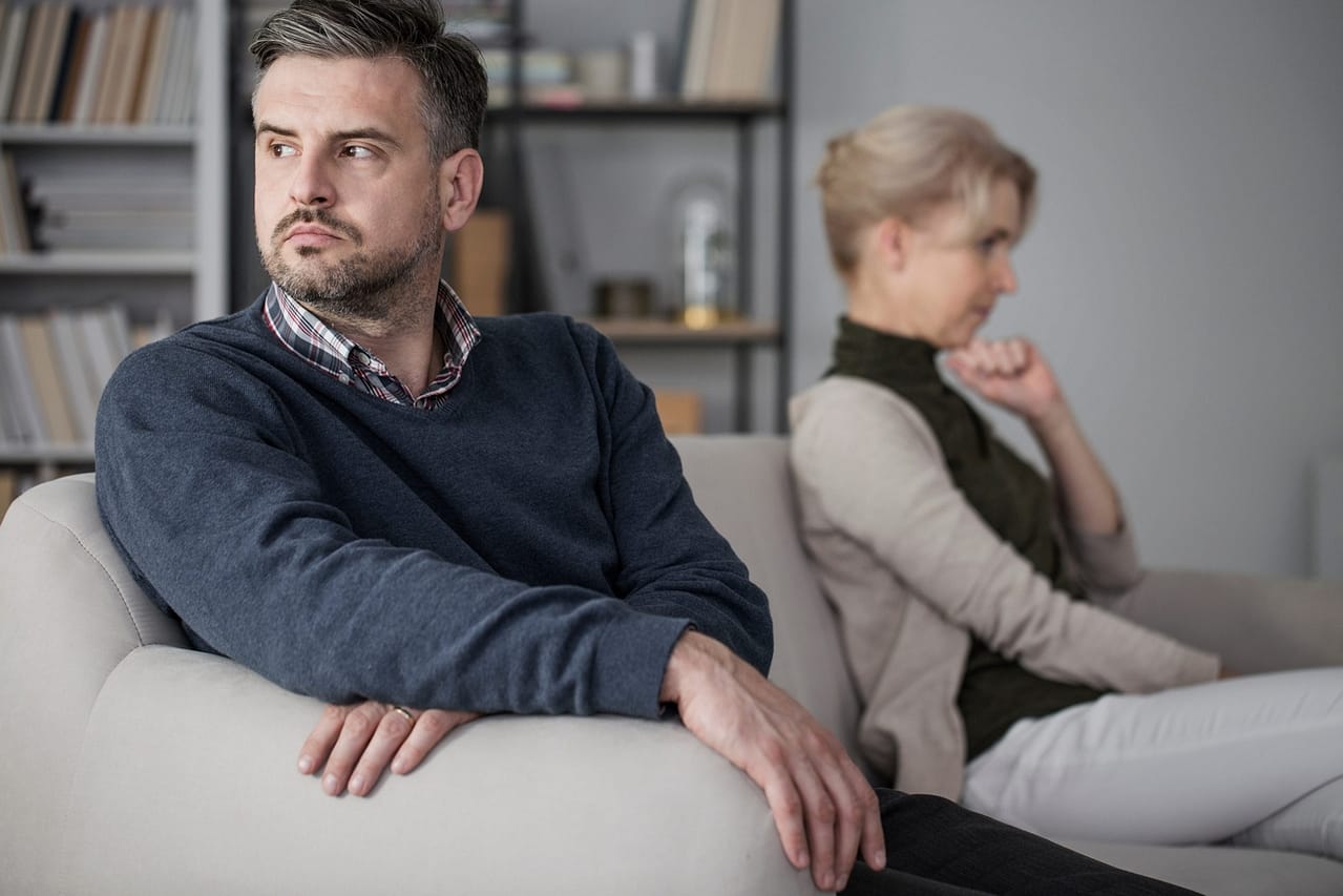 couple sitting separately